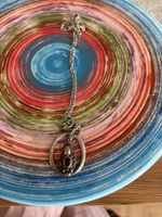 Collier argent style vintage avec grenade entouré d’or jaune