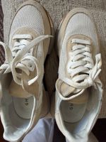 A vendre baskets Ghoud femme beige et noir bon état