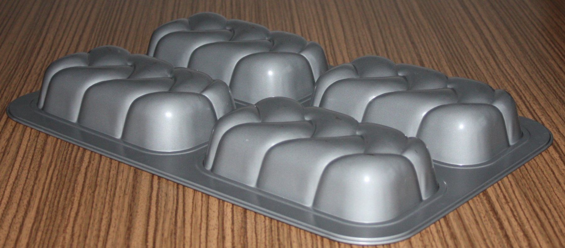 Backformen: Backblech 4 Zöpfli 15.5x8.5x3.8cm – Gebraucht aus Flüelen von Diversicum-Shop 1