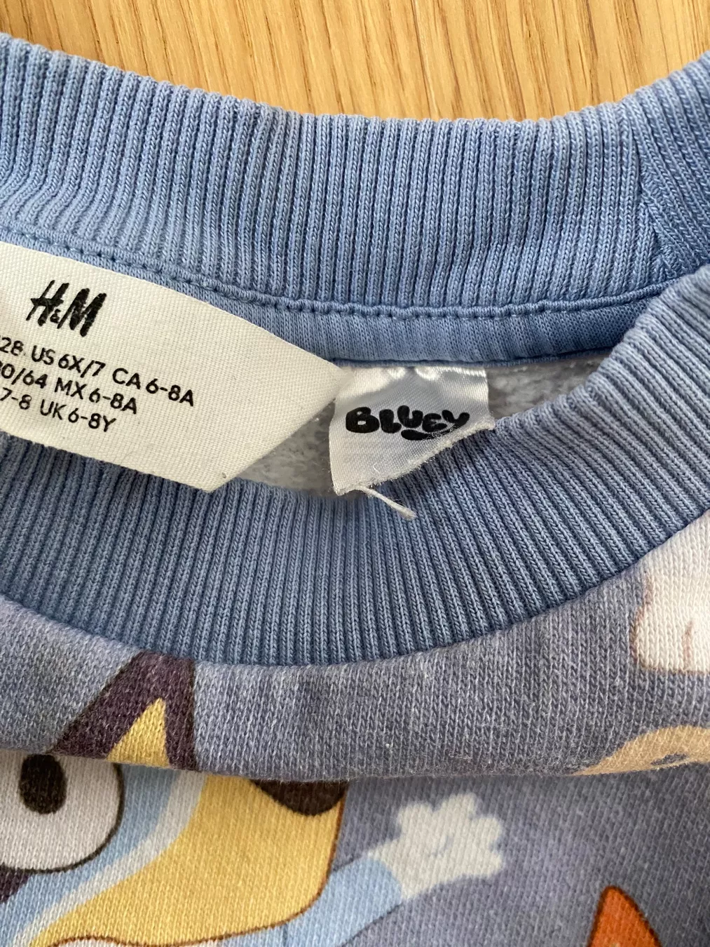 H&M Maglioni & Felpe: BLUEY Pullover 122/128 H&M – Usato da Einsiedeln venduto da PaedeK84 3