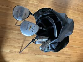 Golftaschen und Schläger