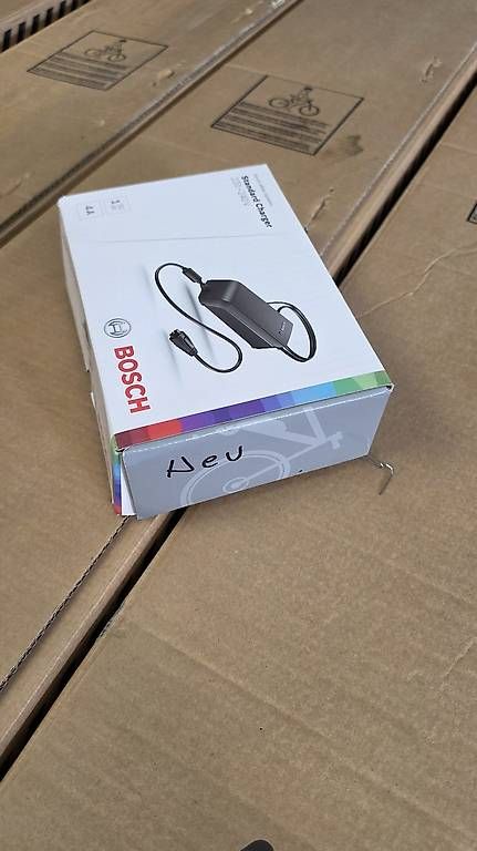 Chargeurs: Ebike Ladegerät Bosch – Neuf avec emballage d'origine à Bronschhofen par Timi.g 1