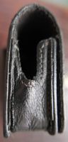 Étui caméra CANON en cuir souple, noir. Usagé.