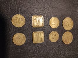 4 Jetons de 0,5-1-2-5 francs