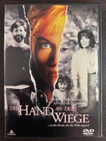 Die Hand an der Wiege