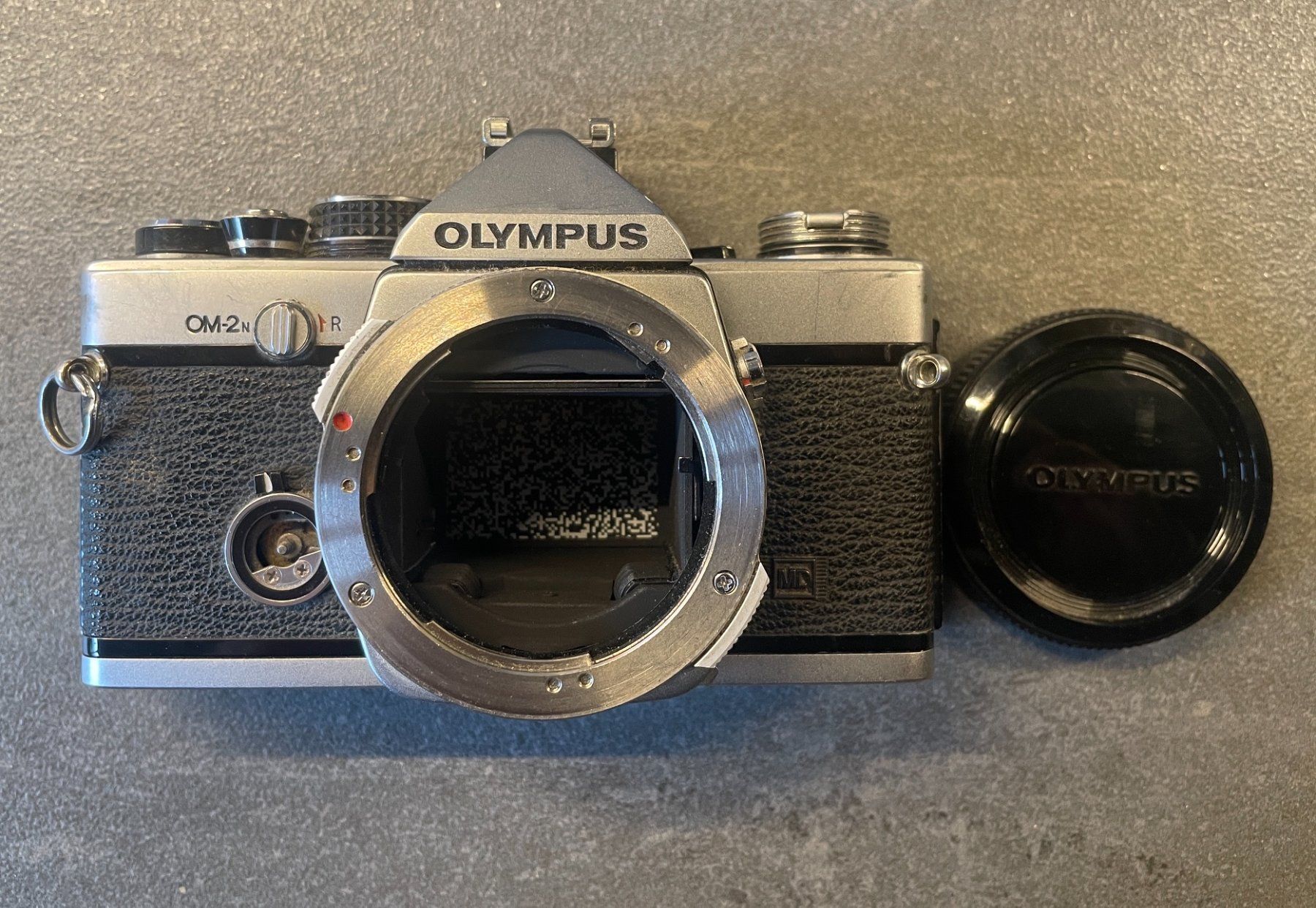 Olympus Fotocamera: Fotoapparat Olympus OM-2N Body – Usato da Scuol venduto da SAK 5