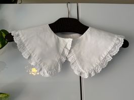 Weisser Spitzenkragen