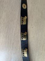 Ledergurt mit Kuh-Motiven und Schnalle, schwarz
