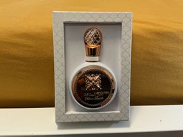 Parfum Lattafa Fakhar  dans son emballage d'origine.