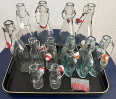 12 verschiedene Glasflaschen 