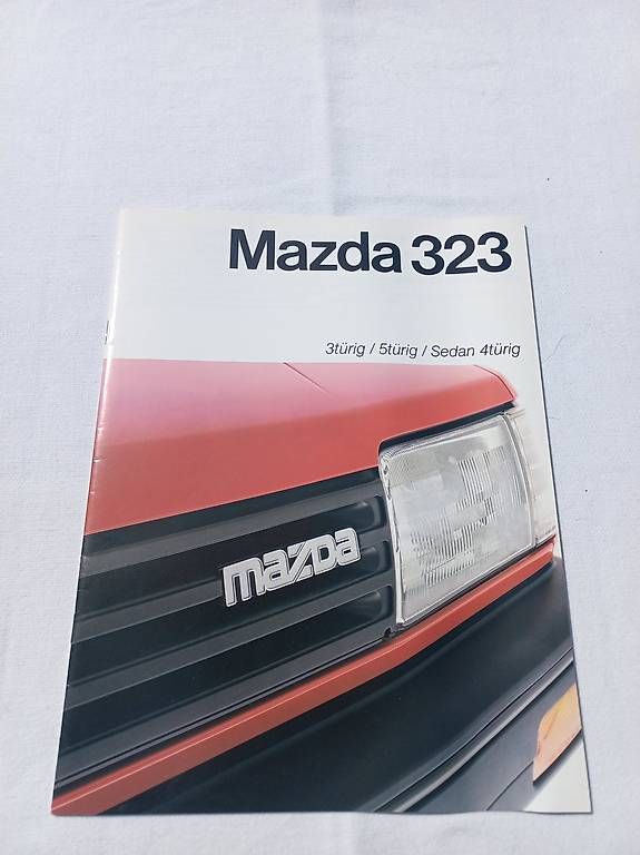 Documents: Mazda 323 Prospekt / 1985 – D'occasion à Frauenkappelen par Chruetzhubel
