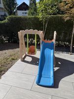 Kinderschaukel mit Rutsche