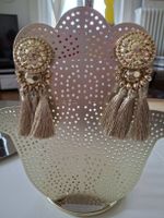 Boucles d'oreilles dorées pompons