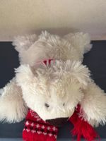 Ours en peluche blanc avec foulard rouge
