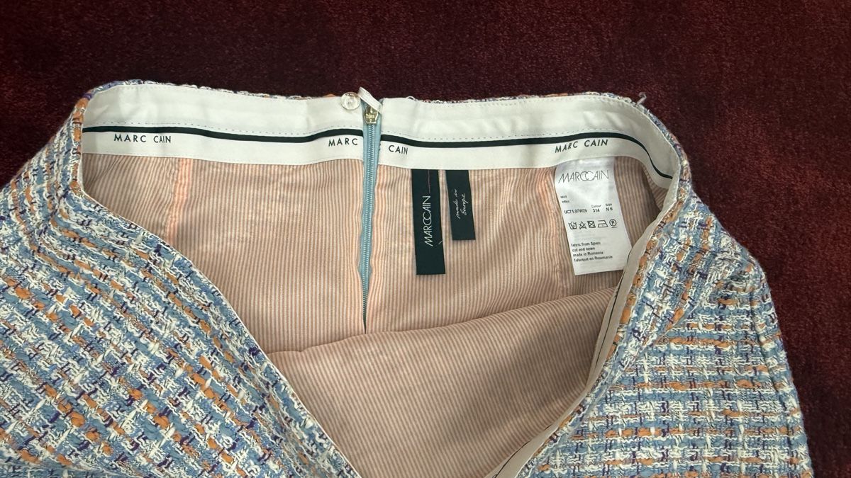 Marc Cain Gonne: Marc Cain Minirock, Bouclé-Optik – Usato da Lachen SZ venduto da HelvetiaLuxury 1
