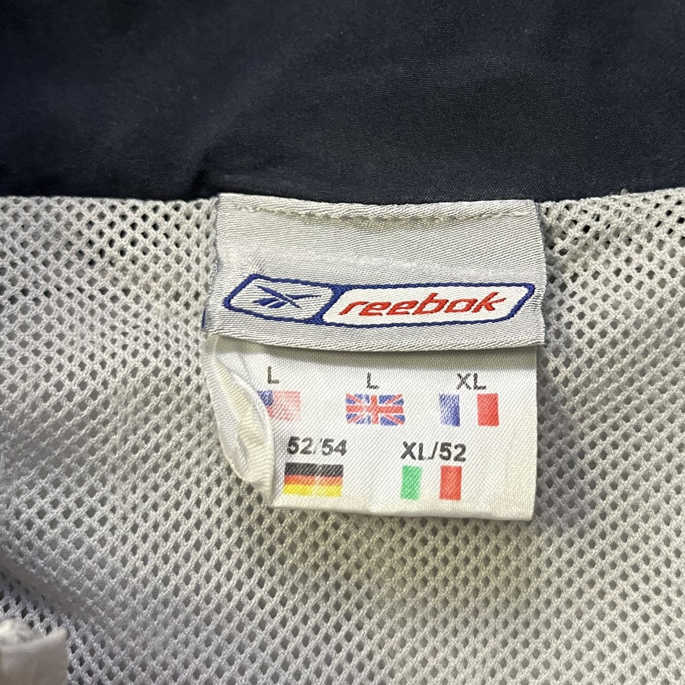 Reebok Giacche: Vintage Reebok Trackjacket (L) – Nuovo (secondo la descrizione) da Chamoson venduto da Sapoloshop 2