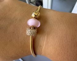 Pandora Armband mit Charms Gold  neu