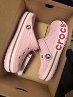 Pink crocs