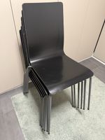 6 Stapelstühle schwarz Metallgestell gebrauchter Zustand