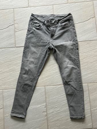 Graue mid waste skinny jeans