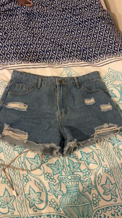 Shorts en jean déchirés bleus taille L