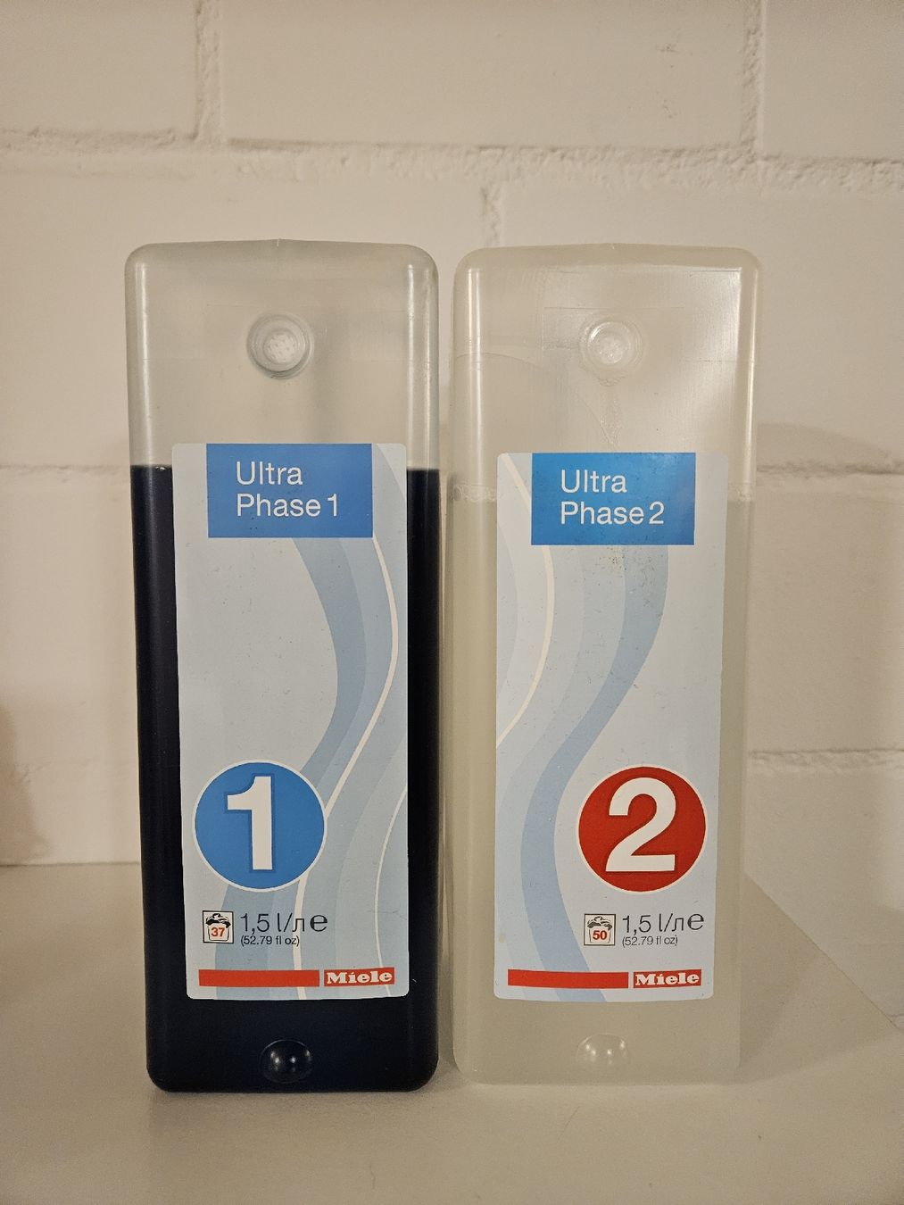 Miele Produits d'entretien: Miele UltraPhase 1 + 2 Zweikomponentenwaschmittel – Neuf (Voir description) à Saland par Rose0109