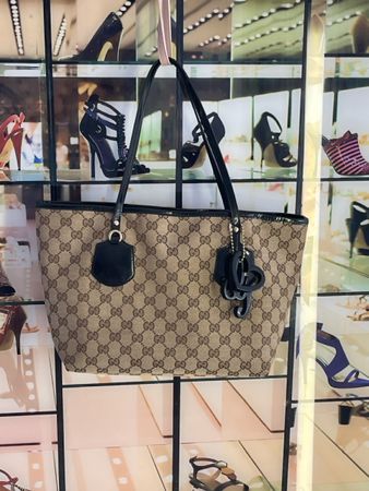 Sac Gucci GG Monogramme toile marron cuir noir
