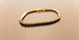 goldenes Armband mit blauen Zirkon-Steinen (Bijou)