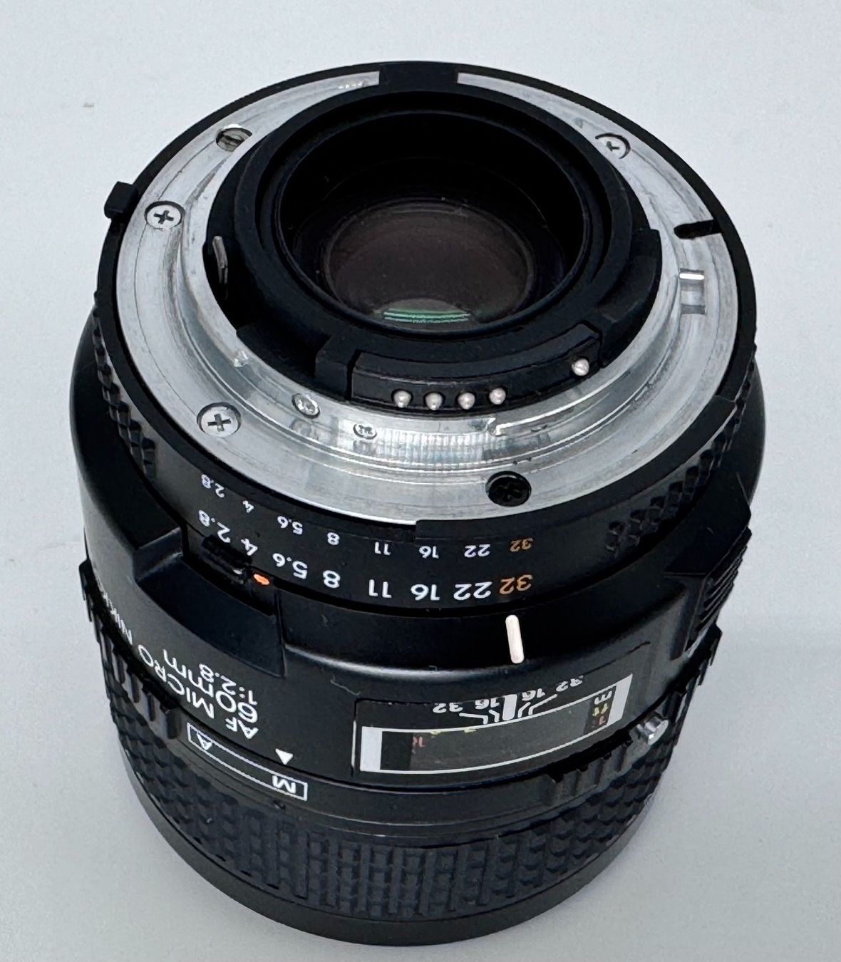 Nikkor Objectifs: Objectif Micro Nikkor AF 60mm f/2.8 état neuf – D'occasion à Mézières VD par Potentiel 3