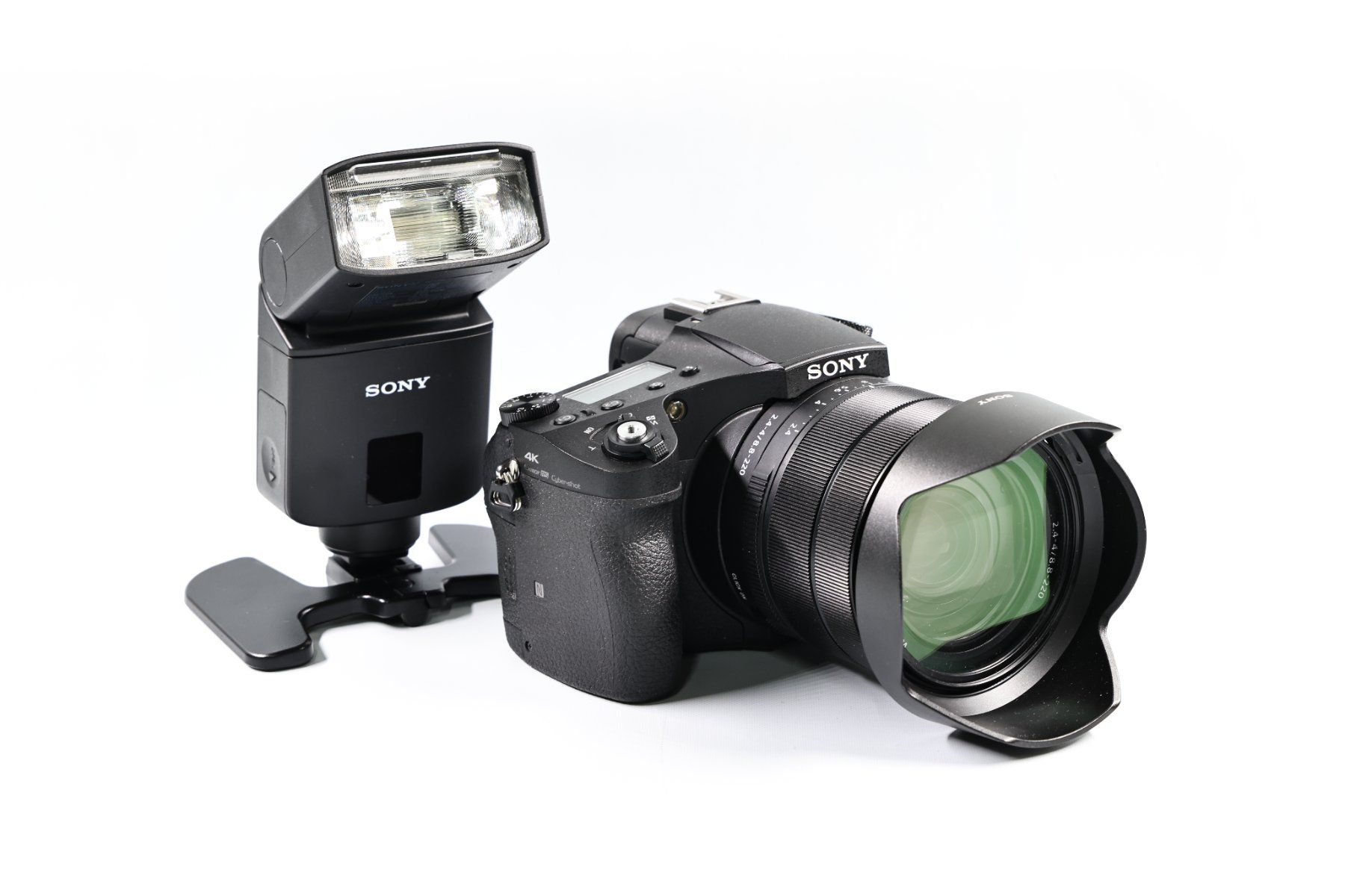 Sony Fotocamera: Sony Bridge RX10 III mit externen Blitz – Usato da Galgenen venduto da Fmg 6