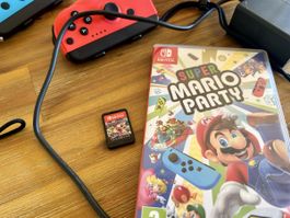 Nintendo Switch mit 4 Controllern + 2 Spiele – sehr guter Zu
