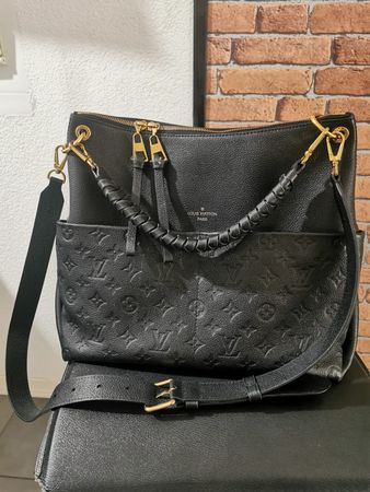 Louis Vuitton, Maida Hobo noir en parfait état.