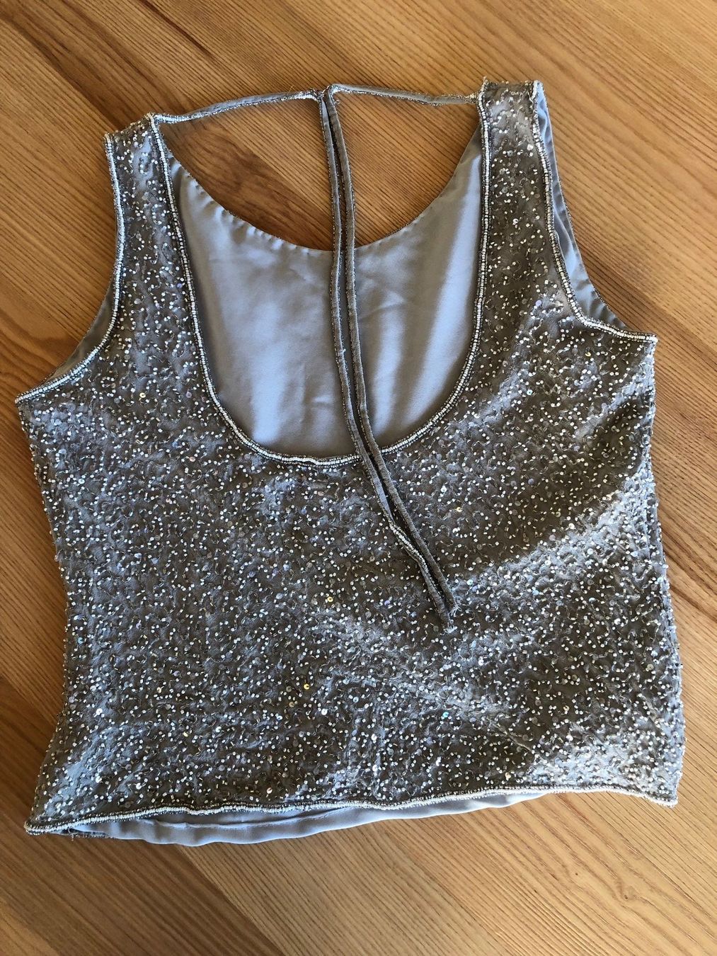 Top: Top grigio/argento Mis.42/44 IT – Usato da Davesco-Soragno venduto da dvf_7h6d 2