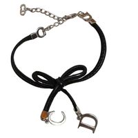 Vintage DIOR Bracelet schwarzer Schleife und CD-Anhängern