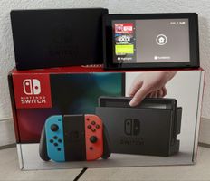 Nintendo Switch Konsole mit Spielen und Zubehör