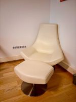 Fauteuil + repose pied en cuir