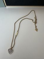 Guess Kette Herz Anhänger mit G und Steinen Guess Goldfarben