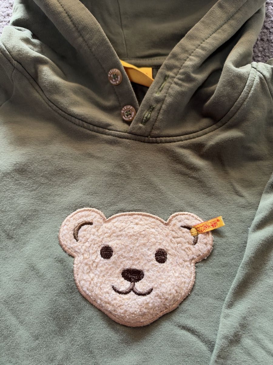 Steiff Pulls et sweat-shirts: Steiff Kapuzenpullover Grösse 116 – Neuf (Voir description) à Ebikon par KarinM02 1