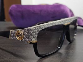 Gucci GG0484S Lunettes de soleil oversize en peau de serpent