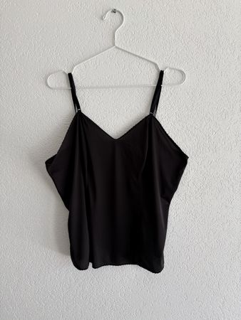 Haut noir en nylon Antron taille 38 très bon état