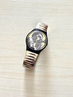 Swatch Armbanduhr Motiv Goldfarbenes Metallband gebraucht