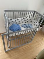 Beistellbett mit Rollen