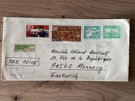 Enveloppe DDR avec timbres divers par avion