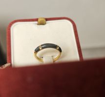 Ring mit Onyx (grün) und Zirkonia (vergoldet)