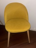(Senf)Gelber Stuhl im Retro Design 