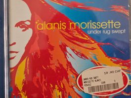 Alanis Morrisette, Under rug swept