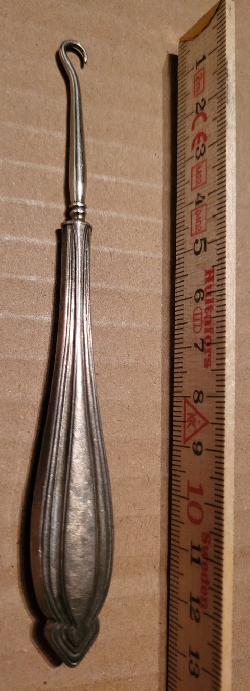 Ferramenta: Knöpfhaken mit silbernem Griff – Usato da Basel venduto da gbe_8hlw 2