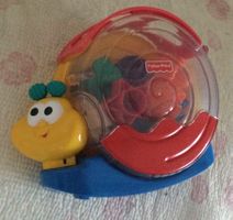 Schaukelschnecke mit Melodie und Formen / Fisher Price