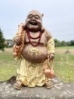Lachender Buddha Figur – Glücksbringer für Haus & Garten