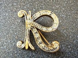 Vintage-Brosche mit Initiale R goldfarben mit Strass.